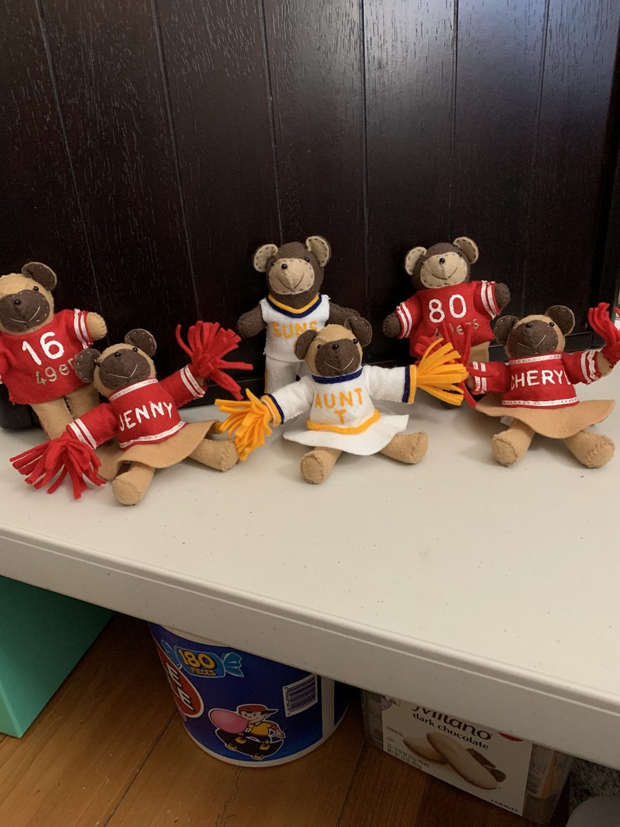 A cheerful handmade lineup with team spirit, names, and personalized character.
