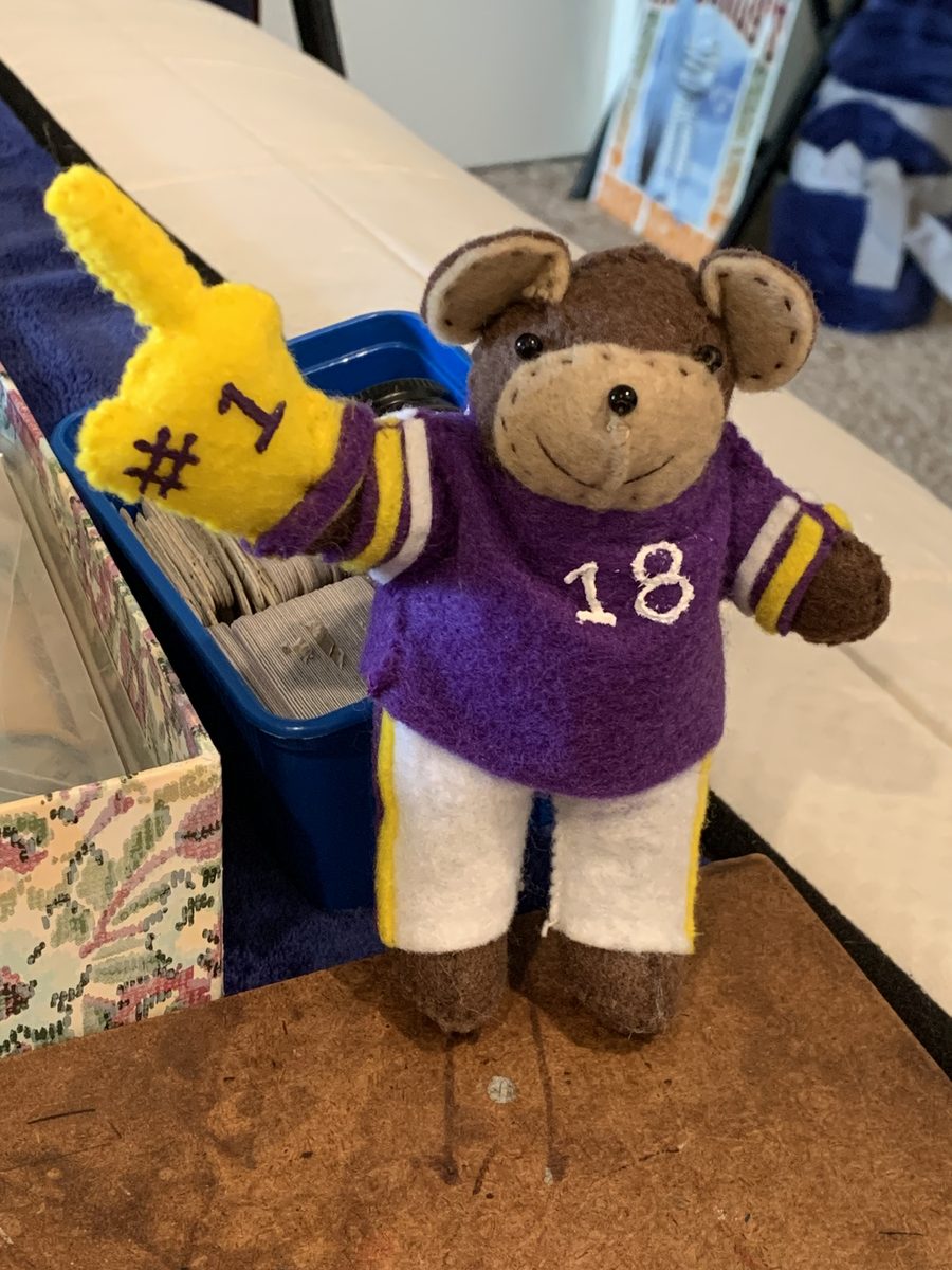 Sports-themed handmade mice and dolls, customizable for your favorite teams and players.