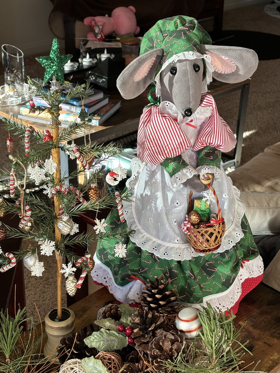 A large holiday mouse arranged as a statement piece for seasonal display.